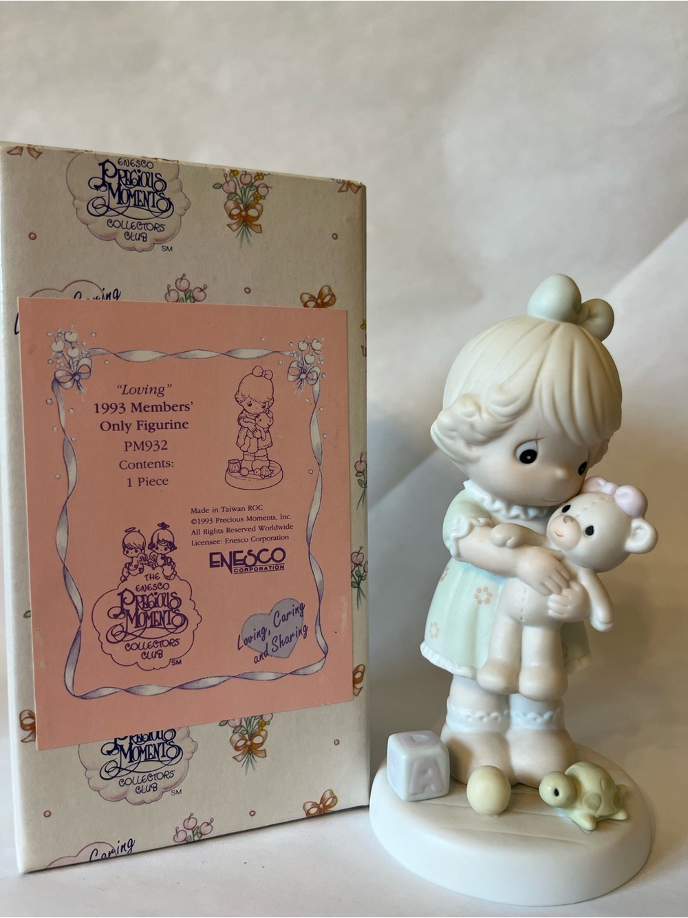 Enesco Precious Moments Figurine in Mint Green and Cream Holding Teddy